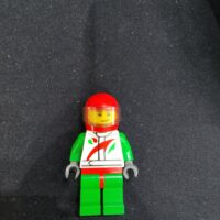 Race Car Driver, White Racing Suit with Octan Logo, Red Helmet with Trans-Brown Visor, Crooked Smile with Brown Dimple